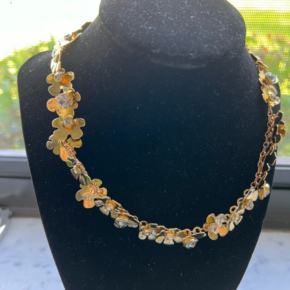 henri bendel Jewelry - HENRI BENDEL GOLD TONE FLORAL SHAPE NECKLACE WITH CLEAR and BLUE CRYSTALS